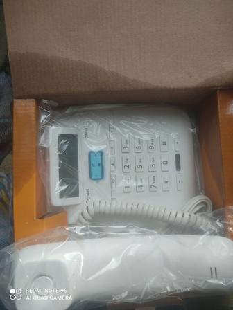 Проводной телефон с громкой связью и определителем номера