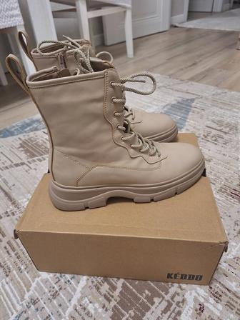 Продам новые зимние сапоги