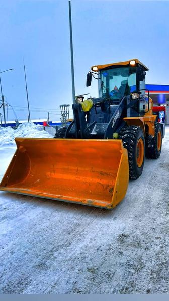 Фронтальный Погрузчик и КамАЗы