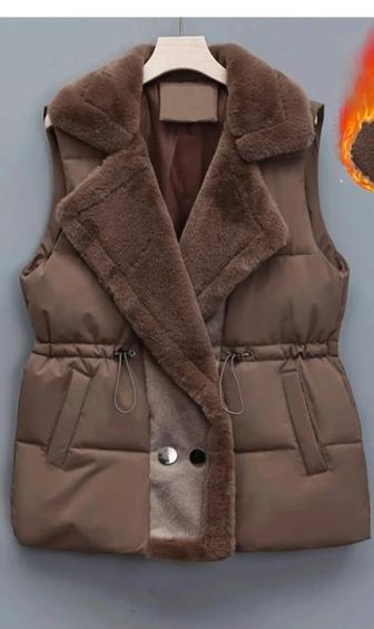 Жилетка меховая шикарная