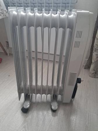 Масляный обогреватель.