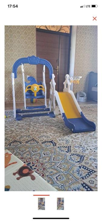 Детский уголок с качелями