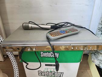 Отдам даром DVD-player с микрофоном