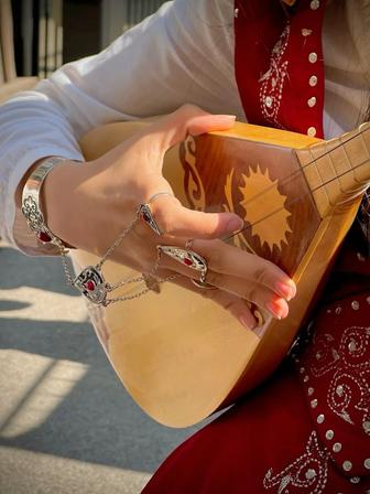 Домбыра үйрену