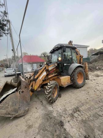 Услуги трактора экскаватора погрузчика, погрузка мусора, уборка снега.