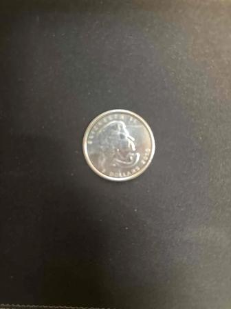Канадская серебряная монета в 5 доллар пробы 9999