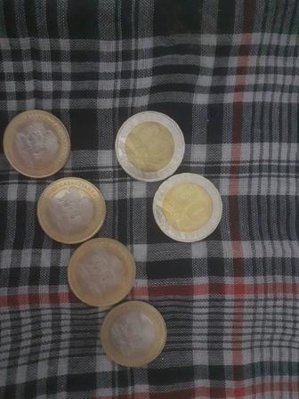 Монеты 100,200 тенге