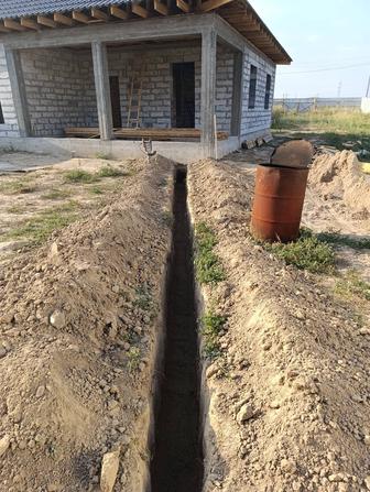 Проводим канализацию и водопровод,колпаки траншеи, септик, туалет