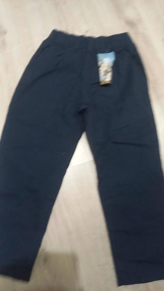 Продам темно синие брюки с этикеткой