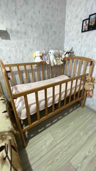 Кроватка детская. С маятником