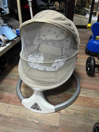 Шезлонг для новорожденного