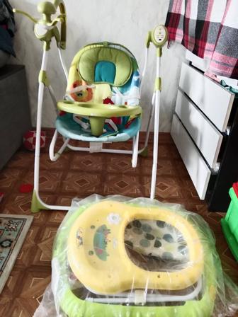 Срочно продам качели в подарок ходунок