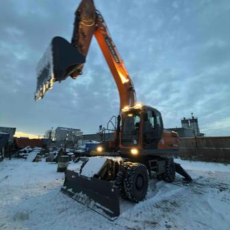 Услуги колесного экскаватора