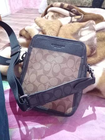 Продам мужскую барсетку от бренда Coach