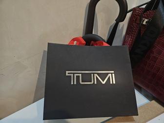 Сертификат Tumi