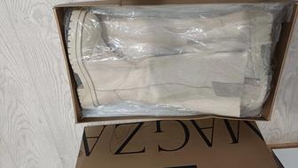 Продам сапоги новые