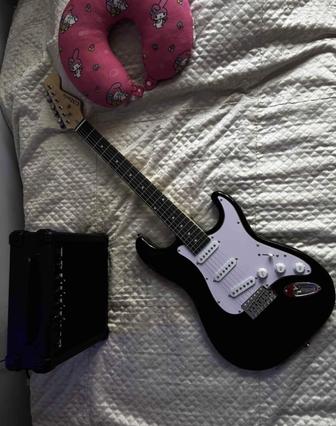 Продам электронную гитару срочно с колонкой и подставкой для гитары