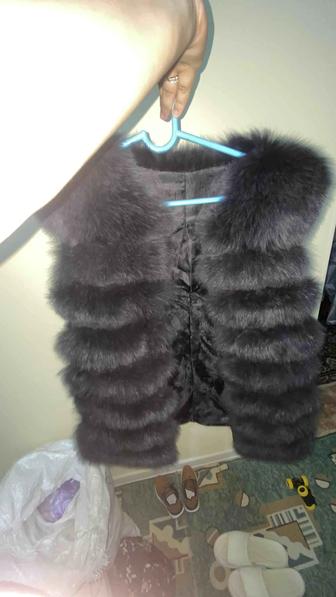 Женские жилетка