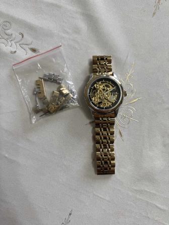 Продам часы qlls механические