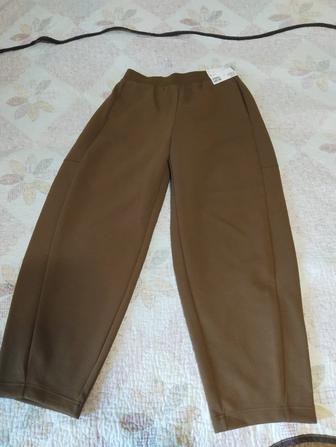 Продаю женские брюки 48 размер , UNIQLO, новые, цвет коричневный