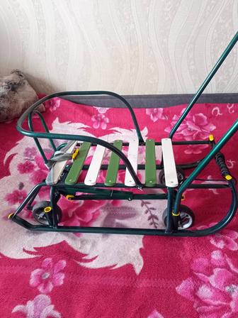 Срочно продам санки с колесами