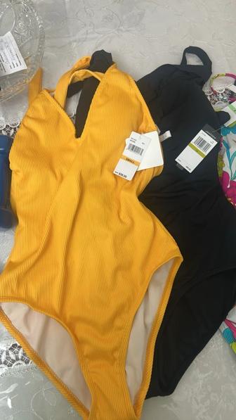 Купальники