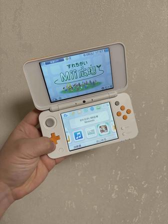 Nintendo New 2DS XL (бело-оранжевая)