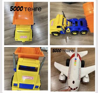 Продам игрушки камаз и самолет