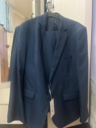 Продаю костюм новый с этикеткой 52размер