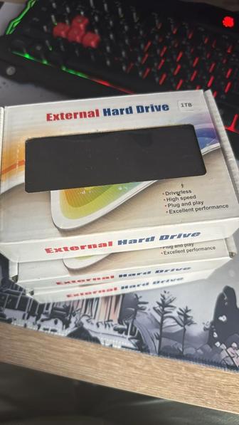 Внешний жесткий диск 1 Тб, новые