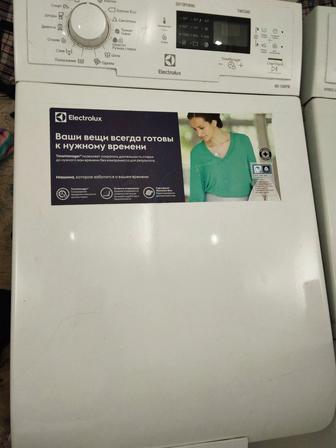 Отдам даром вертикальную стиральную машинку Electrolux