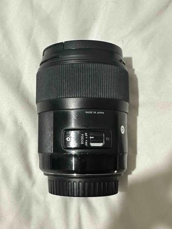 Объектив Sigma 35 mm 1.4