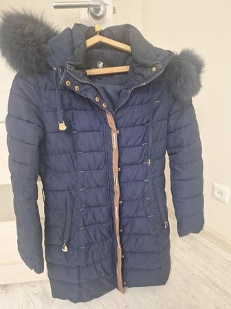 Продам женский пуховик