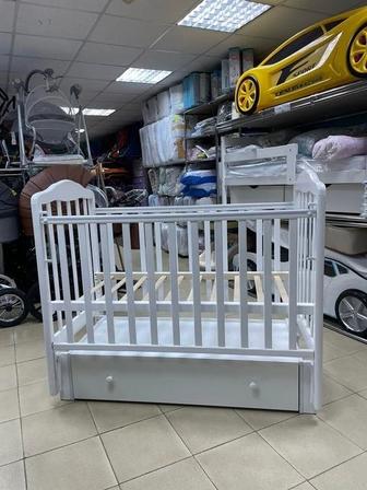 Продам детскую кровать с матрасом и бортиками