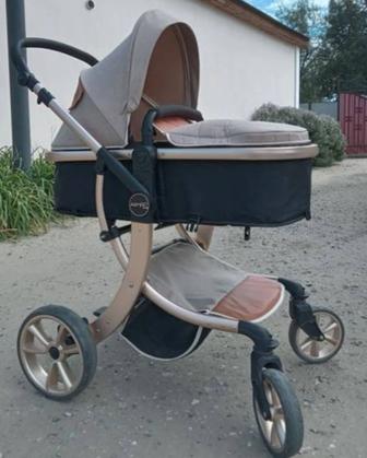 Продам коляску и ходунок