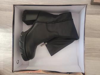 Продам зимние сапоги