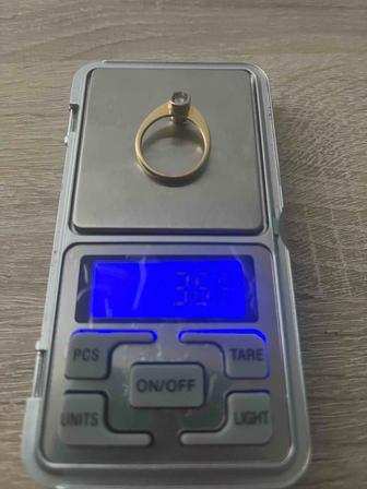 Золото. Золотое кольцо с бриллиантом 750 пробы