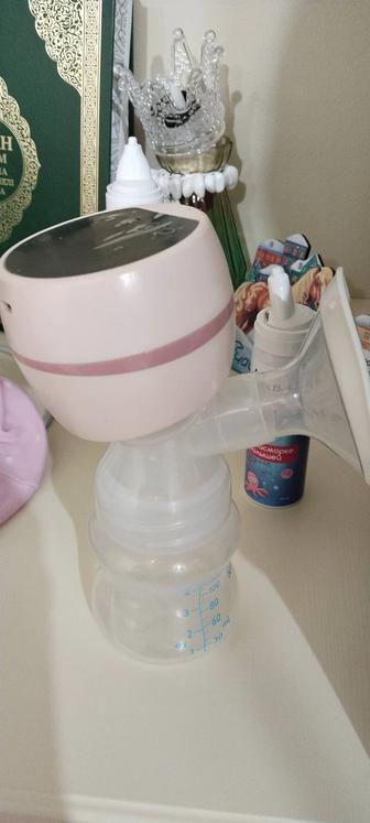 Электрический молокоотсос