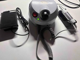 Машинка для маникюра профессиональная(не использованная) фрезы в подарок