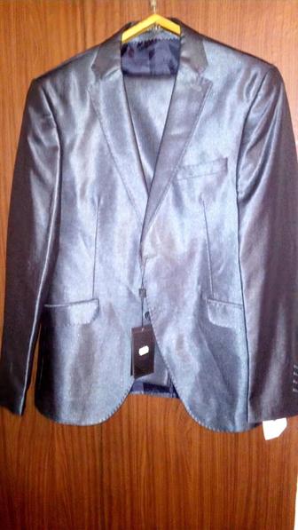 Продам новый костюм с отливом Узбекистан