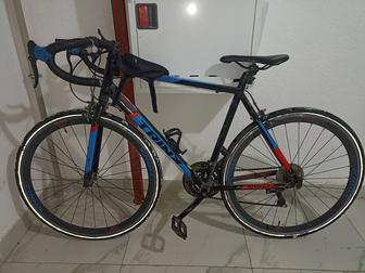 Шоссейный велосипед trinx 1