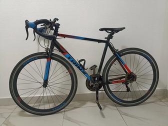 Шоссейный велосипед trinx 1