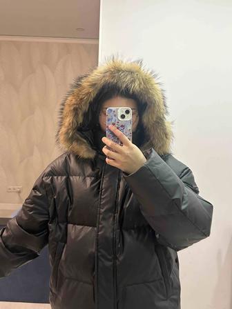 Продам зимний пуховик новый
