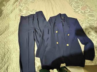 Костьюм и брюки темно синего цвета