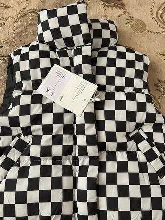 Безрукавка на девочку