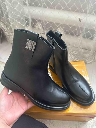 Продам новые зимние сапоги