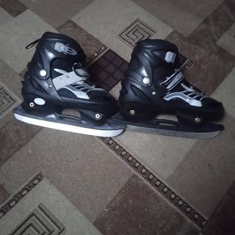Продам коньки детские размер с 34-36(лезвие раздвигается (