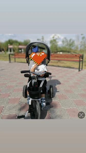 Продам трехколесный велосипед с ручкой