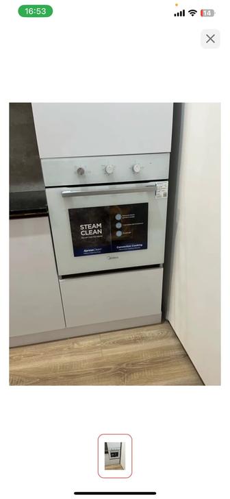 Продается духовка Midea белый