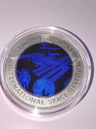 Серебряная монета МКС.